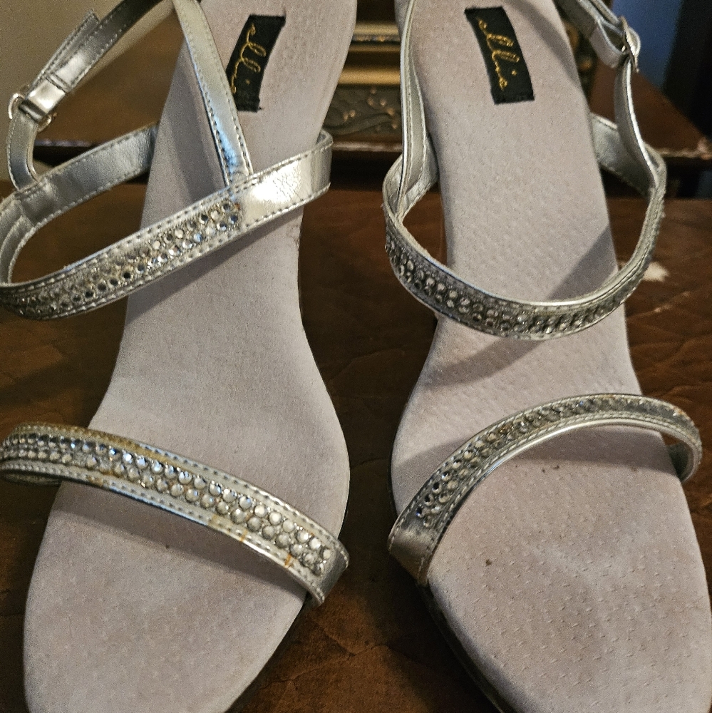 Silver Strappy Heels With Acrylic Heals.